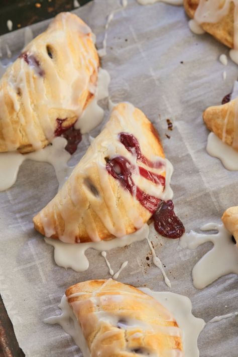 Cherry Hand Pies, just baked. Easy Breakfast Pastries, Cherry Hand Pies Recipes, Fruit Hand Pies, Gemma Stafford, Cherry Hand Pies, Hand Pie Recipes, Bigger Bolder Baking, Fried Pies, Baking Cookbooks