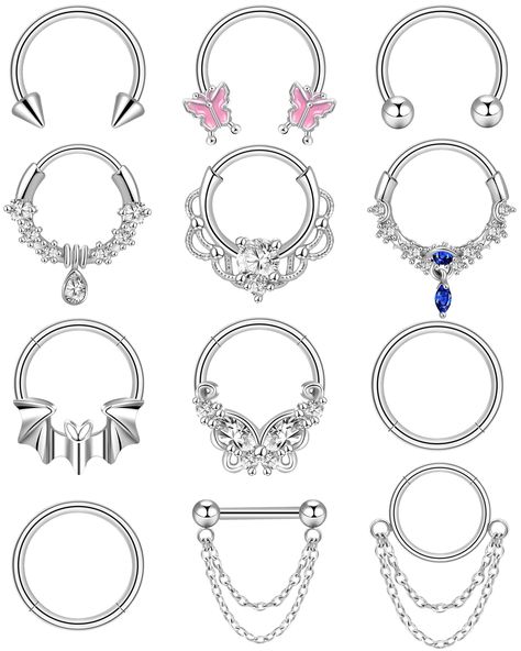 PRICES MAY VARY. PACKAGE INCLUDE - A plastic box come to you with 12 pcs small septum rings for women in silver color, includ plane dangle chain septum ring, butterfly, teardrop, bat, horseshoe, CZ and chain styles. Dainty septum piercings can easy match your daily wear and make you look more fashionable. HYPOALLERGENIC MATERIAL - Cute septum jewelry are made of stainless steel, lead & nickel free, friendly to sentive skin. The surface of septum nose rings have highly polished, which are very sm Small Septum Piercing, Septum Rings Small, Cute Septum Rings, Lip Piercing Jewelry, Septum Piercing Jewelry, Septum Hoop, Daith Piercing Jewelry, Lip Rings, Septum Nose Rings