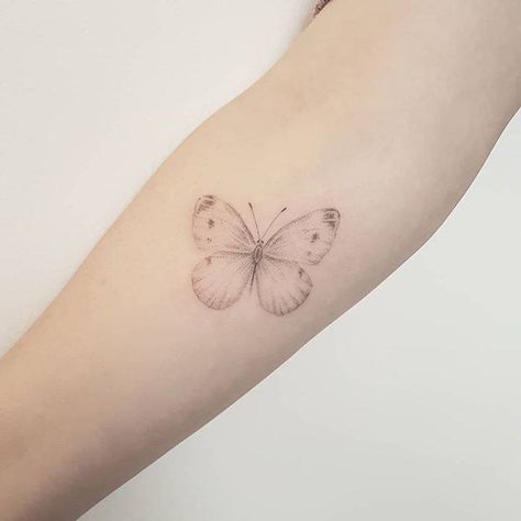 White Butterfly Tattoo, Cabbage Butterfly, Butterfly Tattoos On Arm, Flower Wrist Tattoos, Single Needle Tattoo, Hand Poked Tattoo, Subtle Tattoos, Simplistic Tattoos, White Butterfly