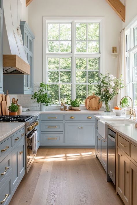 15 Blue Kitchen Cabinet Ideas for a Stunning Transformation – Everyday Inspo Blue Gray Cabinets Kitchen Farmhouse, Best Blue Gray Cabinet Colors, Pastel Blue Kitchen Ideas, Blue Walls Light Wood Floors, Kitchens Blue Cabinets, English Cottage Kitchen Cabinets, Light Blue Kitchen Cabinets Gold Hardware, Blue Brass Kitchen, Blue Accents Kitchen