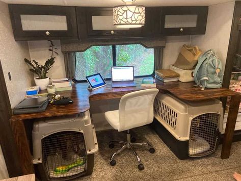 home office space in rv with kennel for dogs Camper Renovation With Dogs, Dog Crate Under Bed In Camper, Camper Pet Ideas, Dog Kennel Camper Ideas, Office In Camper, Rv Kennel Ideas, Skoolie Office Space, Office With Dog Space, Rv Home Office Ideas