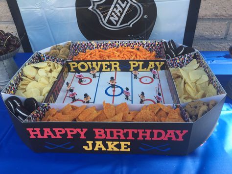 Hockey snack stadium for Jake's 10th bday Hockey Watch Party, Hockey Themed Charcuterie Board, Hockey Party Snacks, Nhl Party Ideas, Road Hockey Birthday Party, Hockey Charcuterie Board, Hockey Decorations Party, Hockey Themed Birthday Party Food, Ice Hockey Birthday Party Ideas