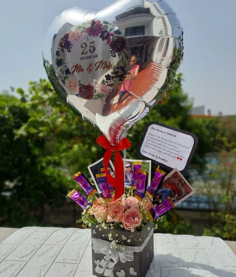 25th Anniversary Hamper for a special couple made of fresh flowers, chocolates and foil balloon Balloon Hamper, Anniversary Hamper, Happy 25th Anniversary, Parents Anniversary, Couples Anniversary, Mehndi Designs For Fingers, 25th Anniversary, Foil Balloons, Happy Anniversary