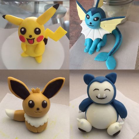 Pokémon characters in fondant: Pikachu, Vaporeon, Eevee and Snorlax Fondant Pokemon Characters, Pokemon Fondant Figures, Fondant Pikachu, Bolo Pikachu, Fondant Characters, Pokémon Cake, Flareon Pokemon, Pokemon Cake Topper, Pokemon Birthday Cake