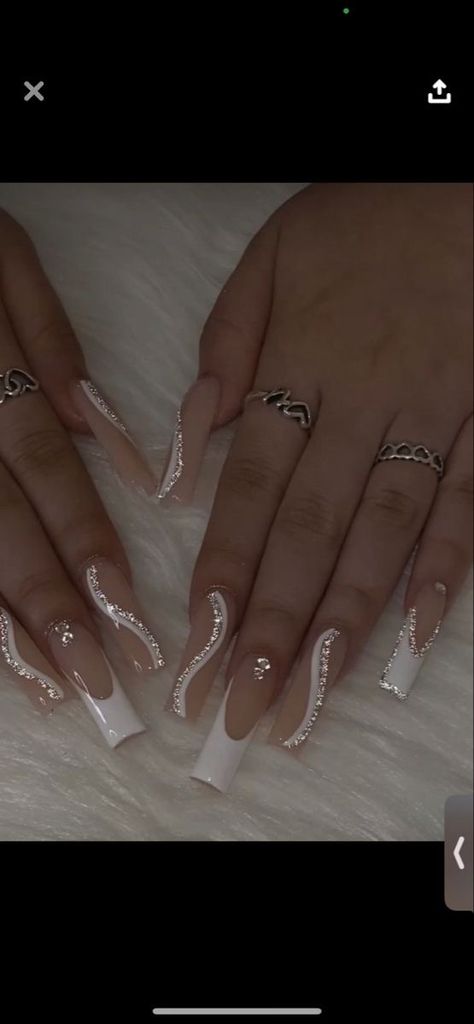 White N Silver Nails, Silver Sparkly Nails Acrylics, White With Diamond Nails, White And Glitter French Tip Nails, White French Tip Nails With Silver, White Nails With Glitter Design, White Silver Nails Acrylic, White Nails French Tip With Designs, White Glitter Nails French Tips