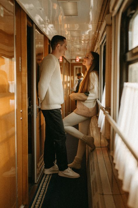 idea for a photo shoot.  filming on the train, coupe.  a couple in love is standing in the corridor of the compartment, they are talking.  the setting sun shines through the window Nanowrimo 2023, Train Photoshoot, Library Photo Shoot, Ghost Train, A Couple In Love, Photoshoot Outdoor, Pre Wedding Photoshoot Outdoor, Creation Station, Luxury Train