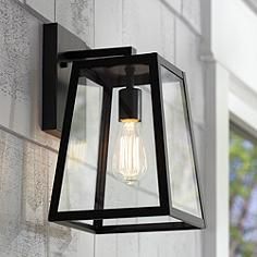 Add light and brightness to your home's exterior with this Mystic black finish outdoor wall light. Farmhouse Outdoor Lighting, House Lighting Outdoor, Outdoor Wall Light Fixtures, Modern Outdoor Wall Lighting, Exterior Light Fixtures, Black Outdoor Wall Lights, Black Light Fixture, Exterior Wall Light, Garage Lighting