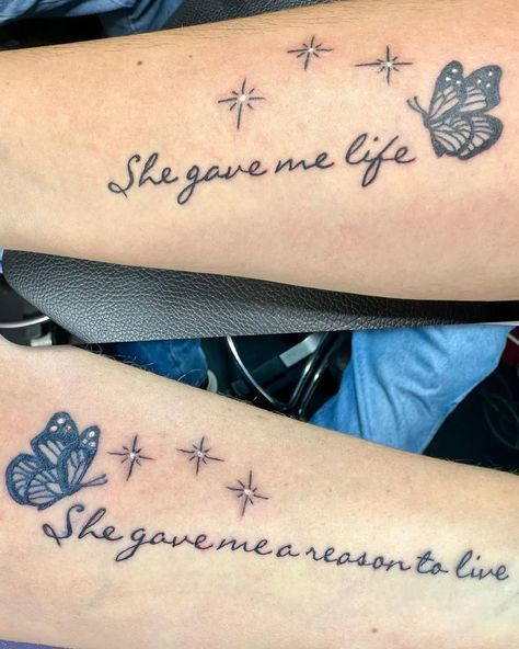 mother daughter tattoos #motherdaughtertattoos #motherdaughtergoals #tattoo #matchingtatto #butterflytattoo #butterfly #mommyandme #life #tattooideas #qoute Mother Daughter Tattoos With Butterflies, Tattoos About Being A Mom, Tattoo For Your Mother, Tattoo Idea Mother Daughter, She Gave Me Life She Gave Me Purpose, Mother Daughter Shoulder Tattoos, Mum And Daughter Tattoo Quotes, Matching Tattoos Mother Daughter Butterfly, Butterfly Tattoo Mother Daughter