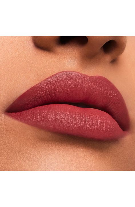 What it is: A long-wearing, lip-adoring lipstick with striking, plumping color in a velvety matte finish (coveted shades are refillable). What it does: Make the moment with a match for every power move. This long-lasting, high-performance lipstick saturates lips with statement-making, wearable color designed to flatter all skin tones. It stays color true and wears for 10 impactful hours while resisting bleeding, feathering and creasing. The plush powder complex delivers a smooth, velvety matte finish. The naturally derived Moisture Lock Complex provides extra lip-adoring care while you wear. Lips look immediately plump and smooth, with a more defined and sculpted appearance over time. The expertly designed bullet is perfectly shaped to help sculpt the curves of your lips with effortless pr Matte Lipstick Colors, Dream Makeup, Beauty Lips, Women Lipstick, How To Apply Blush, Makeup Help, Natural Lipstick, Glam And Glitter, Long Lasting Lipstick