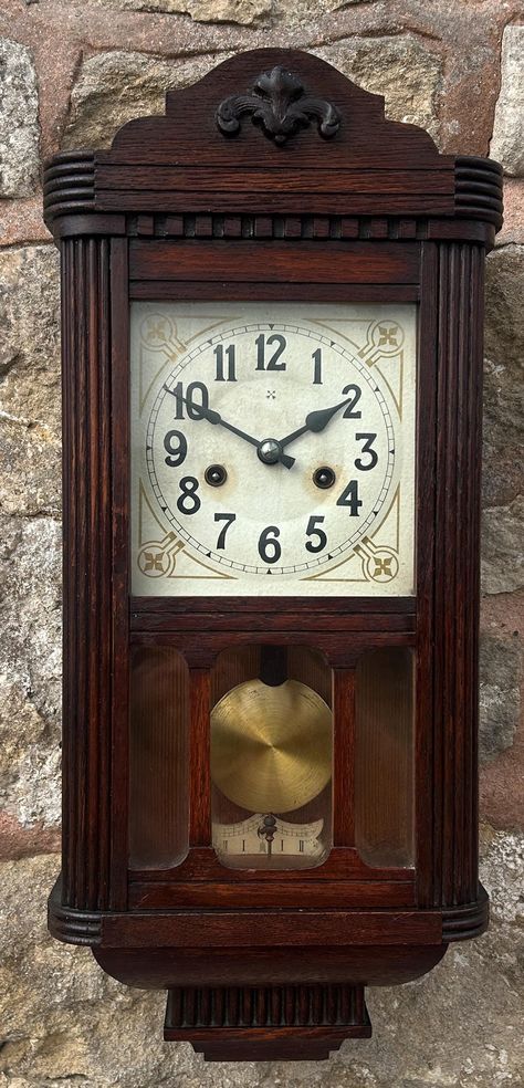 Original HAC dial  8 day striking movement Original hands  Original finish  Working Order, recently serviced Comes with key  Measures 54cm high by 24cm wide 12.5cm deep  Exquisite mini HAC Vienna  Wall clock ca 1900. Nice solid wood case with glass viewing window on the front bottom and both sides. Wonderful original hac dial and original hands. In its original condition.  Good condition for age, showing minor signs of age and cosmetic wear to the case and stand. Dial shows signs of age Please v Chic Tattoo, Vintage Clocks, Home Clock, Clock Repair, Wall Watch, Vintage Timepiece, Old Clocks, Antique Clock, Vintage Wall Clock