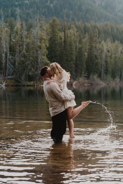 Playful and Perfect Engagements in Grand Teton National Park | Rocky Mountain Bride Pinterest Engagement Photos, Sultry Couples Photoshoot, River Engagement Photoshoot, Engagement Pictures In The Mountains, Engagement Photos On The Lake, Couple Shoot In Mountains, Mountain Picnic Photoshoot, In The Lake Photoshoot, Outside Photography Ideas