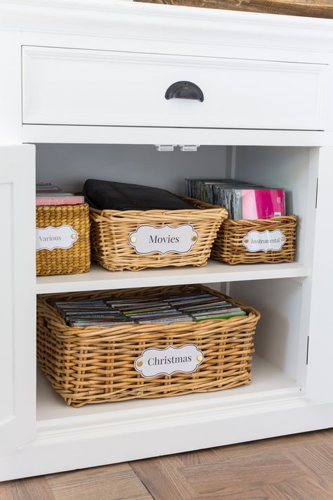 Looking for ways to affordably organize smaller items in your home in cabinets using decorative storage bins, boxes and baskets. Don't settle for style-less plastic bins and boxes when you can tweak handled baskets found for a dime at the thrift shop into really cheap decorative storage baskets to help you organize your home in style... and no DIY skills are needed. #homeorganizing #homestorage #homestoragesolutions #storageorganizers #decoratingwithbaskets #DIYDecor #FreePrintablelabels Basket Storage Ideas, Labels For Organizing, Book Basket, Basket Labels, Decorative Storage Bins, Baskets For Shelves, Thrift Store Decor, Decorative Storage Baskets, Work Office Decor