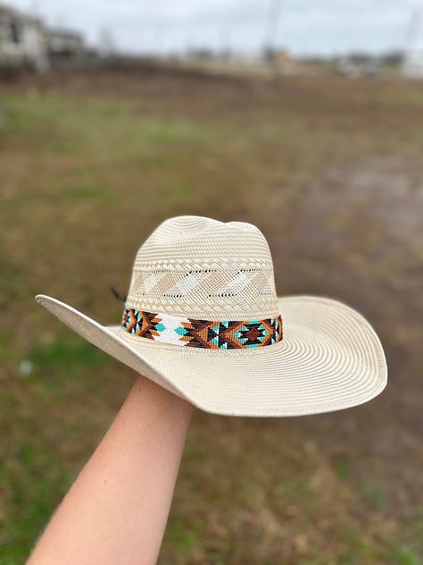 This beaded hat band will bring to your western look. Featuring bright, intricate beading, this hat band will bring a pop of color and texture to your wardrobe. Make a statement with this unique accessory. -The leather adds a extra 11 inches. The leather ties make the hat band adjustable to your hat. -The length of the entire band is 33 inches. (Hat is not included) I do the Beaded work and my boyfriend does the leather work of the hat bands.  ( These hat bands take 3-4 weeks depending on the orders that might be in front of you) ( Disclaimer: All items are uniquely crafted and created by GenZCreations. Our Items are NOT AUTHENTIC American Indian or Alaska Native American nor do they represent any Indian Tribe) Vaquera Hats, Tooled Leather Hat Band, Cow Boy Hats, Western Hats For Women, Womens Western Hats, Cowgirl Hats Western, Cowboy Hat Bands, Beaded Hat Bands, Casual Country Outfits