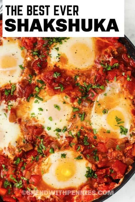 Bright & savory, this colorful Shakshuka dish is absolutely bursting with flavor! It can be made mild or spicy, either way this delicious and different breakfast dish is sure to please. #spendwithpennies #shakshuka #recipe #breakfast #easy #Israeli #eggs #best #withfeta #fresh Eggs Shakshuka Breakfast, Shakshuka Eggs, Easy Breakfast Dishes, Butter Spreads, East Recipes, College Recipes, Shakshuka Recipe, Shakshuka Recipes, Breakfast Easy