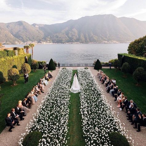 This bride and groom decided on a unique ceremony seating idea that gave every wedding guest a view of the aisle lined with baby breath (and the beautiful mountain backdrop, too!). Head to the link for more creative and modern ways to design your wedding ceremony. // Photo: Andrew Bayda Planner: Nadia Mironova, Anastasia Aslanyan, and Daria Fiorano of Happy Moments Collector Decorator: Masha Kamenskaya Wedding Ceremony Seating, Small Weddings Ceremony, Wedding Isles, Garden Weddings Ceremony, Lake Como Wedding, European Wedding, Ceremony Seating, Wedding Aisle, Wedding Mood