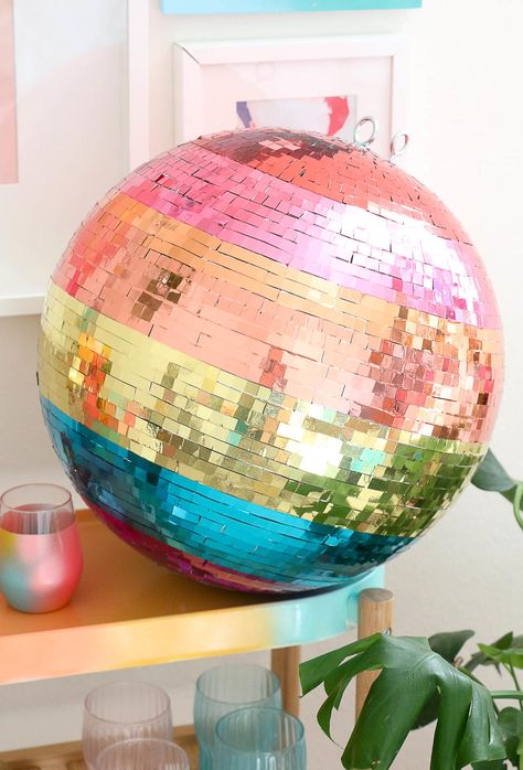 Rainbow Disco Ball | This DIY disco ball project will get everyone on the dance floor at your wedding! Rainbow Disco Ball, Diy Disco Ball, Disco Birthday Party, Disco Party Decorations, Rainbow Parties, Diy Bachelorette Party, Bridal Shower Diy, A Beautiful Mess, Diy Bridal