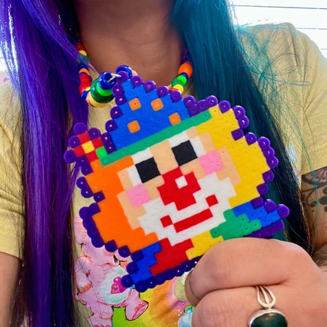 Clown kandi beaded perler necklace clowncore accessories  Handmade large clown Perler necklace in rainbow colors!  Tags; clown clowncore rainbowcore necklace kidcore rave fashion kandicore rainbow jewelry Kandi Wall Hanging, Kandi And Perler, Perler Bead Kandi Necklace, Kandi Display, Perler Beads Necklace, Clown Perler Beads, Clowncore Accessories, Clown Perler, Clown Kandi