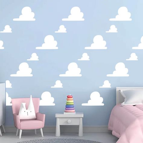 Elevate your child's room to infinity and beyond with our Toy Story style clouds Wall Decal Sticker Pattern. Inspired by the beloved animated film, these whimsical clouds add a touch of magic and imagination to any space. Perfect for nurseries, playrooms, or as a thoughtful gift for little ones, this enchanting wall decal is sure to spark joy and creativity. Whimsical Clouds, Toy Story Bedroom, Toy Story Nursery, Toy Story Clouds, Toy Story Room, Cloud Wall Decal, Boy Toddler Bedroom, Toy Story Movie, Kids Room Wall Decals