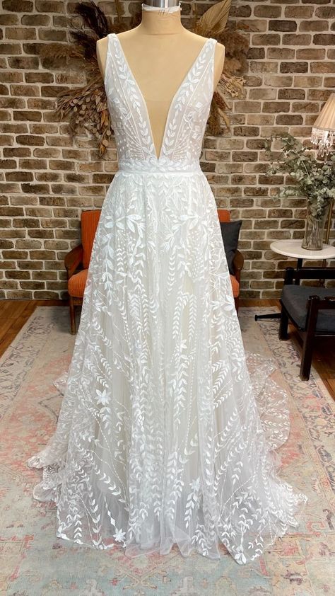 Boho lace a-line wedding dress with plunging neckline, open back, and long train #lifeisbettergilded #gildedbridal #getgilded Floral Sparkly Wedding Dress, Low Cut Wedding Dress, Earthy Wedding Dresses, Rish Bridal, Lace Overskirt, Tulle Overskirt, Outdoor Wedding Dress, Girls Attire, Bridal Designers