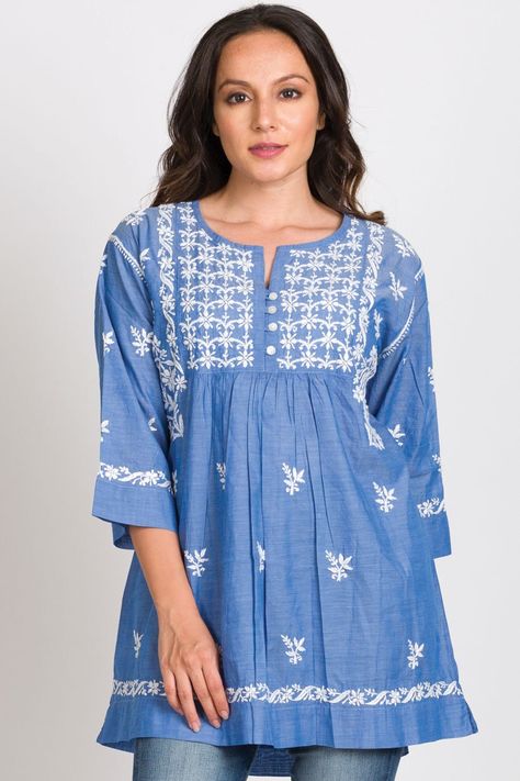 "Our Tarika Chambray Tunic is hand embroidered by women artisans in Northern India in the shadow-work style known as \"Chikankari\". The chambray cotton fabric has a soft blue and ivory weave, adding a rich and elegant texture that enhances the exquisite hand embroidery of this tunic. Chikankari is a delicate and artfully done hand embroidery technique that women in this region have been doing for generations. Available in two sizes, S/M and L/XL." White Dress Embroidery, Chambray Tunic, Magenta Dress, Embroidered Tunic Top, Chambray Fabric, Trendy Fashion Tops, Embroidered Tunic, Embroidery Dress, Vintage Textiles