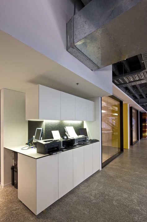 The Warm and Connected Offices of Deepend #office #design #moderndesign http://www.ironageoffice.com/ Classic Office Interior, Printer Station, Office Decor Workplace, Staff Lounge, Loft Office, Office Tour, Corporate Office Design, Office Printers, Office Space Design