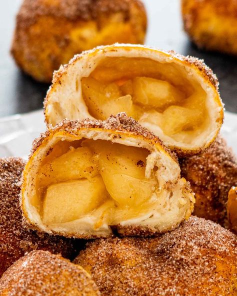 These delicious Air Fryer Apple Pie Bombs are incredibly simple to make using refrigerated biscuits filled with apple pie filling, cooked in the air fryer then coated in butter and cinnamon sugar. #airfryer #applepiebombs #recipes Air Fryer Apple Pie, Stuffed Biscuits, Apple Pie Filling, Apple Pies Filling, Cinnamon Sugar, Pie Filling, Air Fryer Recipes, Apple Pie, Air Fryer