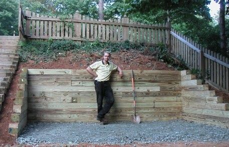 landscaping idea - wood retaining wall Railroad Tie Retaining Wall, Sleeper Retaining Wall, Retaining Wall Steps, Wood Retaining Wall, Backyard Retaining Walls, Sloped Backyard Landscaping, Building A Retaining Wall, Landscape Stairs, Landscape Steps