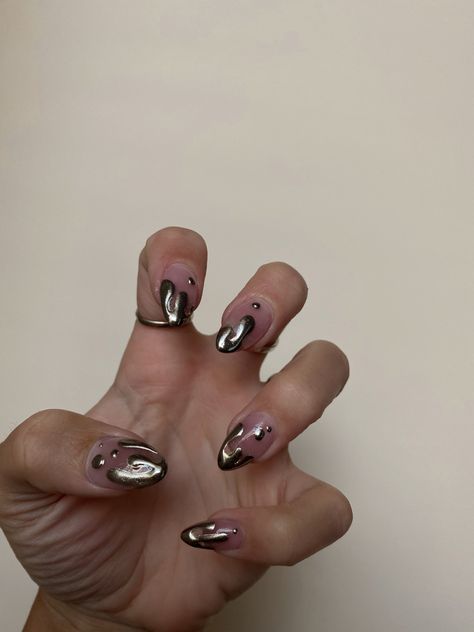 Picture of almond-shaped acrylic nails with silver drippy tips Silver Metal Nail Art, Chrome Drip French Tip Nails, Silver Nails Sns, Melted Silver Nails, Drippy Chrome Nails, Silver Bubble Nails, Silver Blob Nails, Melting Metal Nails, Silver Squiggle Nails