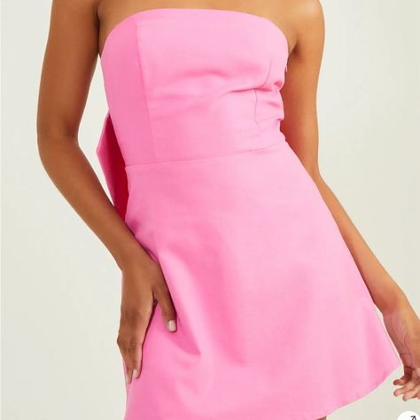 Nwt Lilia Strapless Bow Dress. Pink. Classic Strapless Cut With A Bow Back Detail To Steal The Show. Per Website, This Style Runs Small, Size Up If In Between Sizes. Fitted Mini, Zipper Closure, 40% Linen, 40% Viscose, 10% Polyester, 10% Cotton. Size S Is 25” Length From Neckline To Hem. Bright Pink Homecoming Dress, White Ruffled Mini Dress, Spring Formal Mini Dress With Bow Straps, Formal Strapless Mini Dress With Bow, Chic Pink Mini Dress With Bow Straps, Pink Mini Dress With Bow Straps, Pink Strapless Mini Dress With Ruffles, Hoco Dresses Pink, Red Beaded Dress