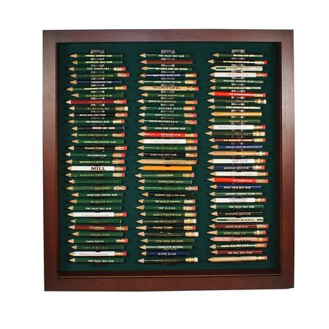 "Just because you got them for free doesn't mean that your golf pencil collection isn't important. With space for 96 pencils, this handsome frame lets you memorialize your golfing history in a simple, elegant way. Comes with a  98% UV blocking acrylic cover that will protect your golf pencil collection from harmful sunlight, dust, and curious onlookers alike. Holds round and octagonal pencils and is available in cherry, black, walnut, and oak finishes. Dimensions: 15.5W x 16.5\"H" Golf House Ideas, Golf Pencil Display, Golf Theme Office, Vintage Golf Decor, Golf Decorating Ideas, Golf Bedroom, Pencil Display, Pencil Collection, Golf Ball Display Case