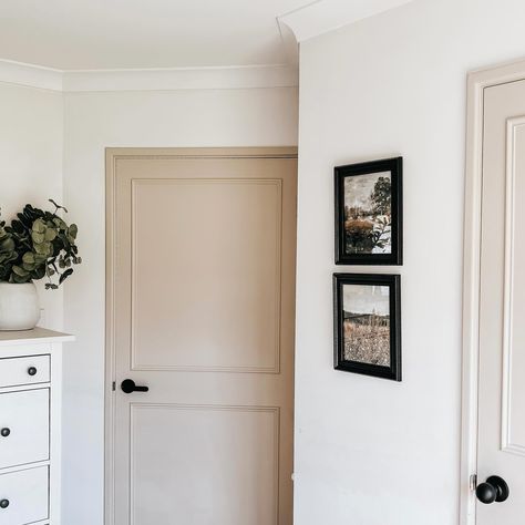 Painting our old interior doors has been such a great update to our home. The beige colour is soft but striking agains the white walls.  #interiordoors #beigepaint #homeDIY #homerenovations #doorpainting #beigedoor White Wall Beige Door, Light Brown Door Paint, White Walls Tan Doors, Interior Doors Beige, Beige Doors Interior, Old Interior Doors, Beige Doors, Old Interior, Beige Wall Colors