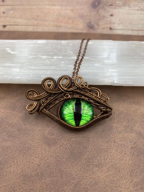 Dragon eye pendant, evil eye jewelry, wire wrapped pendant, wire wrapped jewelry Wrapped Crystal, Wire Wrapping Crystals, Dragon Eye, Jewelry Wire, Dragon Pendant, Eye Pendant, Star Pictures, Wrapped Jewelry, Evil Eye Jewelry