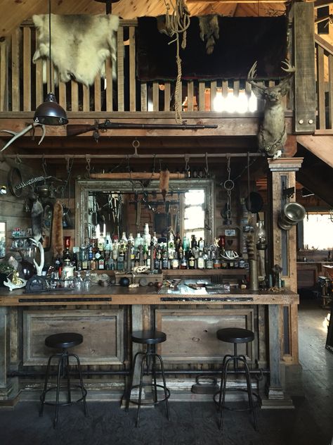 My families "Barn" that has a full western inspired bar, complete with an assortment of guns, antiques and taxidermy. Quentin Tarantino would love this property #thehatefuleight #antiques #saloon #canada #cabin #barn #countryliving #countryhome #loghome #taxidermy #loft #antiquebar #antiquedesign #westernstyle Cowboy Saloon Bar, Old Saloon Bar Ideas, Old West Saloon Bar, Old Saloon Bar, Old Saloon Aesthetic, Western Cantina, Cowboy Bar Aesthetic, Western Bar Aesthetic, Western Saloon Aesthetic