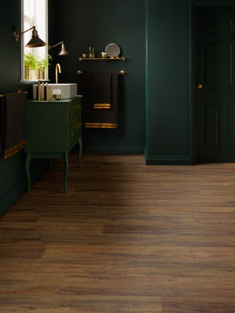 Oak Floor Green Walls, Green Walls Brown Floor, Wood Floor Green Walls, Dark Brown And Green Interior, Green Wall Dark Floor, Lvt Flooring Bedroom, Dark Wood Floor Green Walls, Dark Wood Floors Green Walls, Green Wall Wood Floor