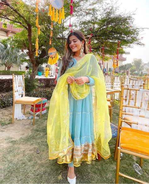 Yellow and light blue an anarkali Light Blue Dress Indian, Blue And Yellow Indian Outfit, Yellow Indian Outfit, New Girl Outfits, Yellow Dress Outfit, Light Yellow Dresses, Yellow Color Combinations, Haldi Decor, Combination Dresses