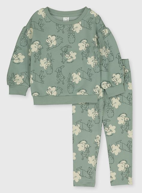 Know a little one who's hopping mad about Peter Rabbit? They'll love this cosy sweatshirt and joggers combo. Decorated with prints of Peter running, jumping and generally larking about, the top has a brushed inner for a cosy feeling and the joggers have an elasticated waist for a comfy fit. Peter Rabbit  1 x Green printed sweatshirt  1 x Green printed joggers Crew neck Brushed inner Elasticated waist Keep away from fire   Material Sweatshirt: 70% Cotton, 30% Polyester (Exclusive O Cotton Jersey Dress, Tu Clothing, Girls Joggers, Sweat Set, Camping Outfits, Printed Joggers, Unisex Baby Clothes, Kids Fashion Girl, Peter Rabbit