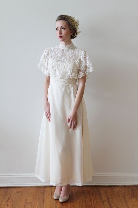 Vintage 1970s High Neck Ankle Length Wedding Dress with French #weddingdress 1970’s Wedding Dress, Wedding Dress Capelet, High Neck Lace Wedding Dress, Hanbok Wedding Dress, Ankle Length Wedding Dress, French Lace Dress, Wedding Capelet, 1970s Wedding Dress, Lace Capelet