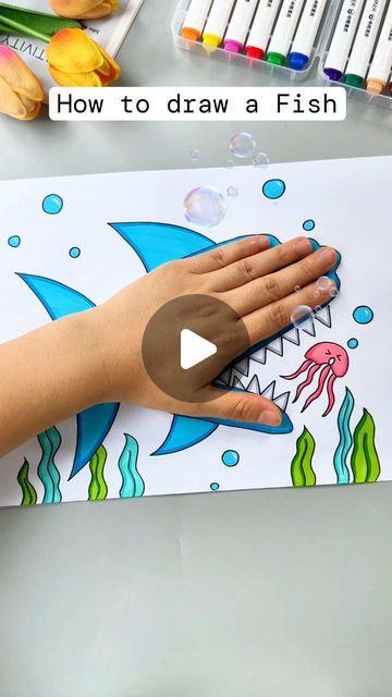 Simple and Easy Drawing Ideas on Instagram: "Learn how to draw a fish with this easy, simple, and creative tutorial! Watch as I guide you step-by-step, starting with basic shapes and lines to form the fish's body, fins, and tail. Add fun details like scales and bubbles to bring your drawing to life. Perfect for beginners and kids, this drawing tutorial will help you create a cute and colorful fish in no time. Grab your drawing supplies and join me for a fun and relaxing art session!" Good Things To Draw Easy, Shape And Form Art Drawings, How To Draw Sea Animals Step By Step, Simple Fish Art, How To Draw A Shark Easy, Drawing Ideas For Beginners Step By Step, Hand Tracing Art For Kids, Easy Beginner Drawings Step By Step, Drawing With Shapes For Kids