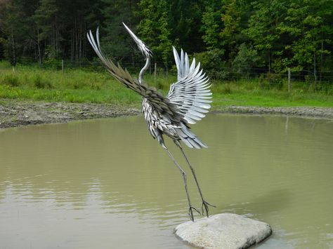 By sculptor James Seaman Metal Garden Benches, Unique Garden Art, Gothic Garden, Wind Sculptures, Crane Bird, Bird Statues, Hanging Wall Mirror, Garden Ornament, Garden Statue