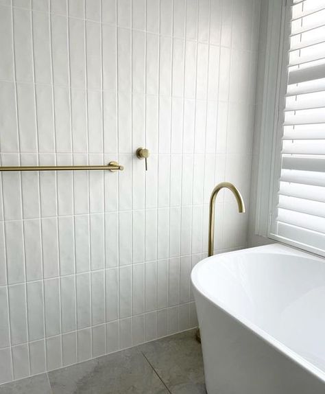 TileCloud on Instagram: "All about the texture 😍😍😍 @tianabuild has used our Newport Matt Subway White Tile and we love how the light shows off all its texture 🙌🏻🙌🏻" 4x12 Subway Tile Shower White, White Stacked Subway Tile Bathroom, Shiny White Tile Bathroom, White Vertical Tiles Bathroom, White Vertical Subway Tile Bathroom, White Tiles White Grout, Long Subway Tile Bathroom, Vertically Stacked Subway Tile, Vertical White Subway Tile