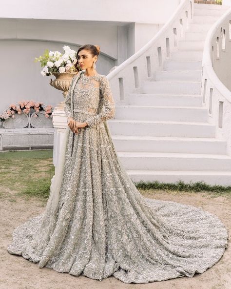 Witness the epitome of bridal elegance— Afreen from our Sayonee collection is an intricately hand-embroidered masterpiece, crafted by the finest artisans, perfect for the moment when only the extraordinary will do ✨💕 #IlsaBySamsara #MadeWithLove #IlsaBride #SamsaraBride #PakistaniWedding #PakistaniBride #PakistaniBridal #Valima #Walima #WalimaBride #ValimaBride #Barat #BaratBride www.ilsabysamsara.com Pakistani Bridal Couture, Gown For Wedding, Grey Lehenga, Nikah Outfit, Lehenga Bridal, Walima Dress, Asian Bridal Dresses, Lehenga Gown, Tail Dress