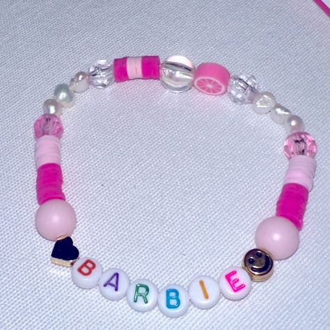 Handmade Word “Barbie” Stretchy Beaded Bracelet. In Adult Size, Measures 8 Inches Around Wrists. Color: Pink Tones/Multi Colored Listing For One “Barbie” Bracelet. See All Pictures. Bundle For 10% Off Order. Thank You For Supporting Our Small Business. #4 Barbie Bracelet, Cowgirl Bracelets, Stretchy Beaded Bracelet, New Barbie, Geometric Bracelet, Clay Bracelet, Barbie Movie, Bangle Bracelet Set, Stainless Steel Bangles