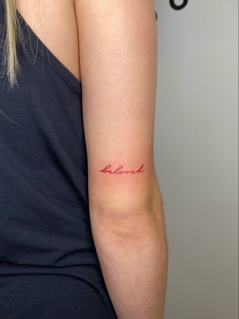 Red Tattoo Quote, Red Writing Tattoo Words, Romance Tattoo Words, Red Ink Writing Tattoo, Red Ink Text Tattoo, Red Word Tattoos For Women, Beloved Tattoo Font, Red Ink Lettering Tattoo, Red Xo Tattoo