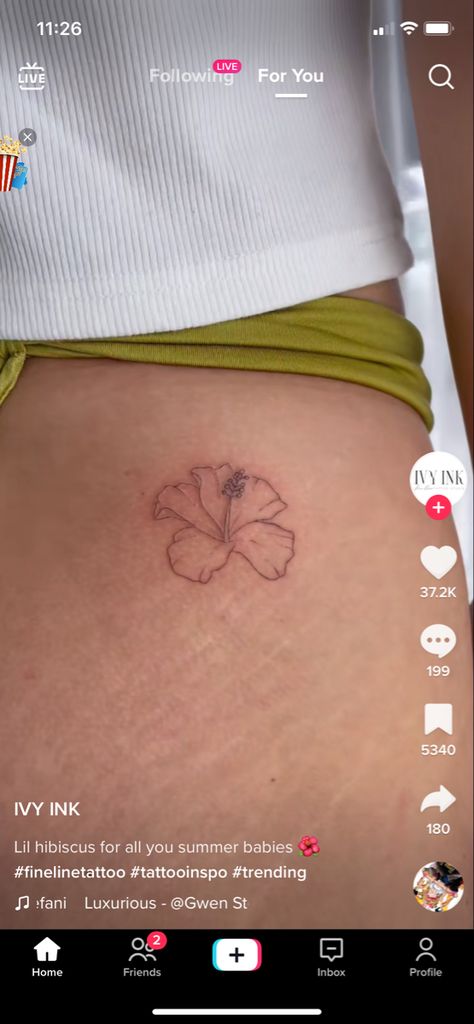 Small Tropical Flower Tattoos For Women, Hip Tattoo Small Flower, Flower Tattoo Hawaiian, Tropical Flower Hip Tattoo, Tattoo Ideas Female Hibiscus, Minimal Hibiscus Tattoo, Dainty Lilac Tattoo, Plumeria Hip Tattoo, Hawaiian Hibiscus Tattoo Small