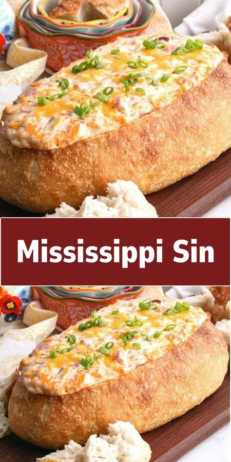 This indulgent dip is perfect for parties and gatherings. It's made by mixing cream cheese, sour cream, chopped ham, green onions, and shredded cheddar, which is then baked inside a hollowed-out loaf of bread. The result is a warm, gooey, and cheesy dip that's addictive. Cheese Loaf Bread, Cream Cheese Loaf, Sin Dip, Mississippi Sin Dip, Baked Dips, Cheesy Dip, Chopped Ham, Cream Cheese Dips, Snack Dip