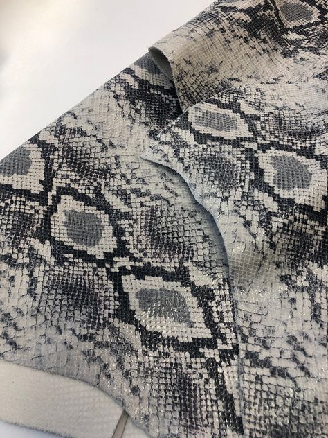 Please, visit our website: https://www.LeatherSkinsShop.com PYTHON LEATHER/ Snakeskin Realistic Python Look Printed Calfskin Leather by Top LEATHER SUPPLIER/ www.LeatherSkinsShop.com PYTHON LEATHER /CALFSKIN LEATHER HIDE Great for Handbags Also available in full skins LEATHER, SUEDE, SKINS, Inc top quality leather supplier, offering a large assortment of leathers and suede for leather makers and leather craftsmen.  Leather supplier for garment, accessories, upholstery and shoe markets. Assorted Snake Fashion, Leather Scrap, Leather Craftsmen, Garment Accessories, Snake Leather, Different Shades Of Green, Leather Luggage Tags, Python Print, Leather Skin