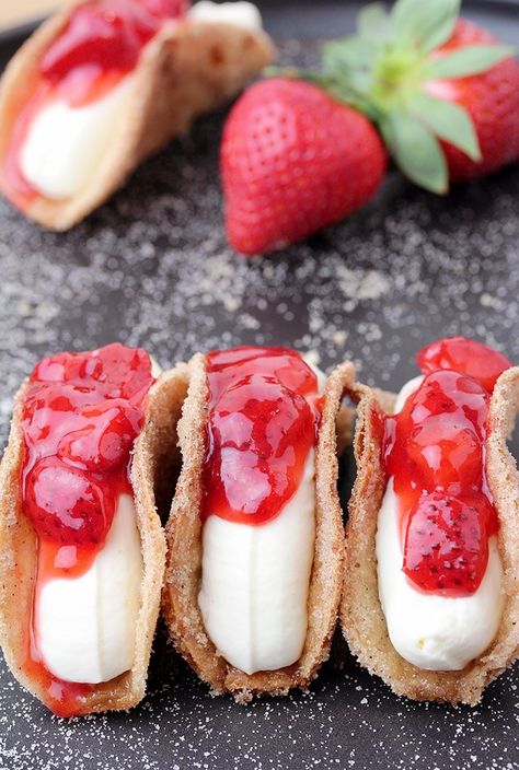 Strawberry Cheesecake Tacos – crunchy cinnamon and sugar tortilla shells, filled with cheesecake and topped with homemade strawberry sauce are perfect bites for every occasion. They are so easy to make, they look great and taste even better. Tortilla Shell Recipes, Strawberry Cheesecake Tacos, Shell Recipes, Cheesecake Tacos, Dessert Taco, Apple Cream Cheese, Homemade Strawberry Sauce, Tortilla Shells, Homemade Cheesecake