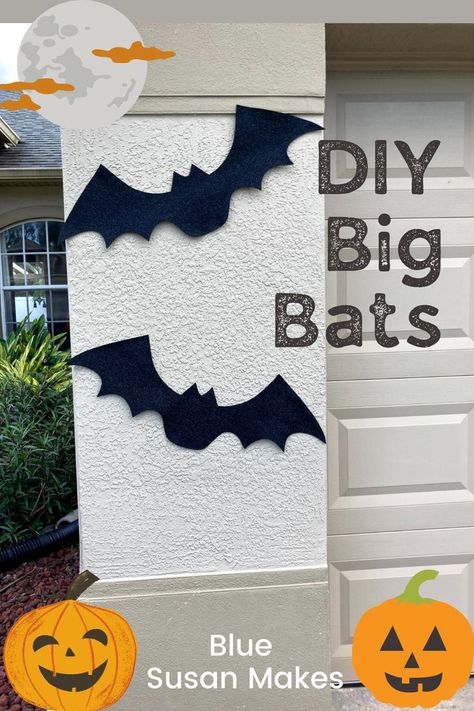 Large bat shapes decorate the garage for Halloween Outdoor Bats Diy, Homemade Bats Halloween, Diy Halloween Bats Outdoor, Halloween Bat Decorations Outdoor, Homemade Bat Decoration, Outdoor Bats Halloween, Diy Bats Halloween, Bat Diy Decoration, Diy Bats Decoration