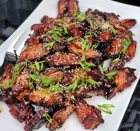 INGREDIENTS (serves 10, 2 wings per serving): PREPARATIONS: In a bag or mixing bowl, pour hoisin sauce over uncooked wings so that wings are coated completely. Allow wings to marinate in sauce for 2 hours, covered. Preheat oven to 375°F. Line a baking sheet with tin foil. Once wings are marinated and oven is preheated, … Factor Recipes, Garlic Wings, Metabolism Foods, Healthy Meats, Baked Chicken Wings, Tin Foil, Meal Kit, Hoisin Sauce, Food Categories