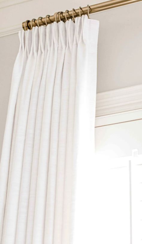 Drapery Wall Bedroom, French Pinch Pleat Curtains, White Pinch Pleat Curtains, Brass Curtain Rod White Curtains, Pinch Pleated Drapes Living Rooms, Triple Pleat Curtains, Roman Shades With Blinds, Kitchen Drapery Ideas, Roman Shades Dining Room